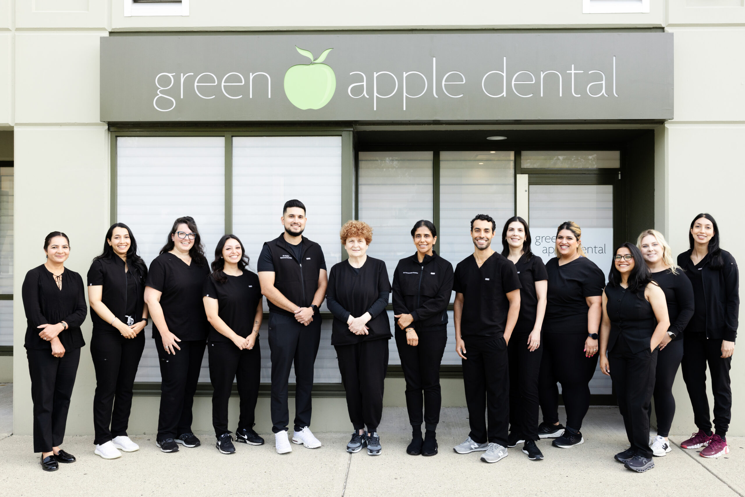 A Green Apple Dental dentist consulting with a patient about jaw pain