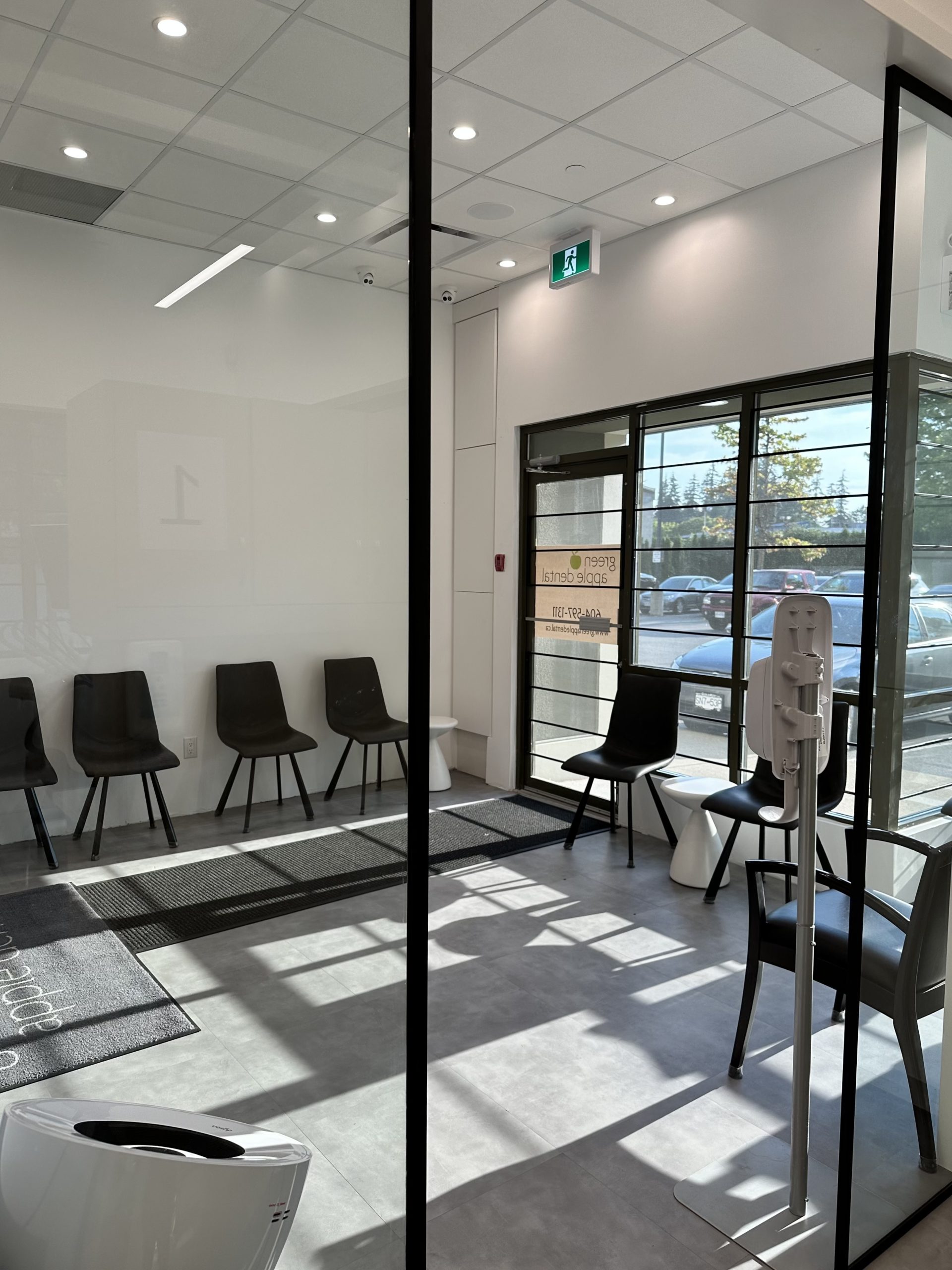 A calm, bright treatment room with a window